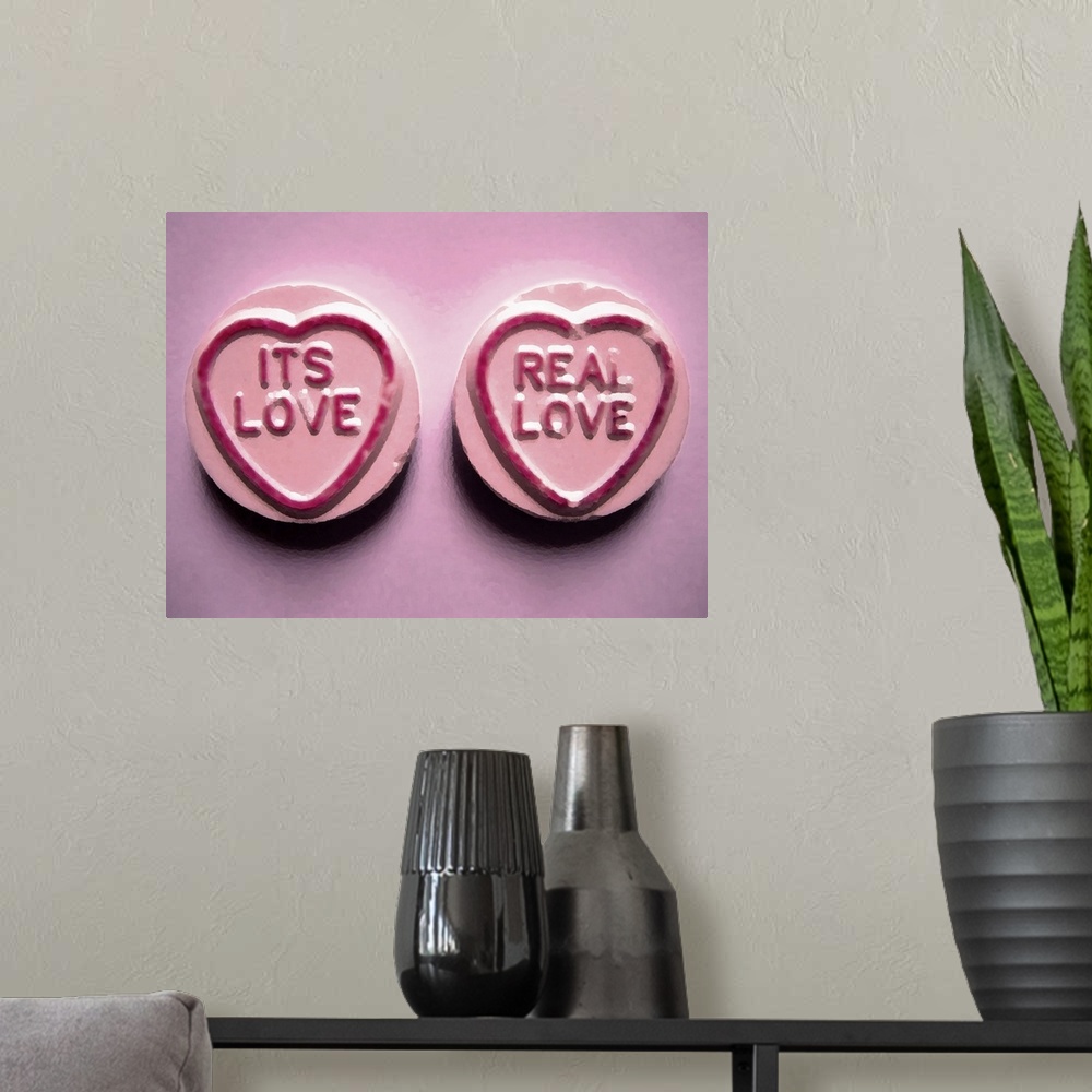 A modern room featuring Love Heart Sweets It's Love, Real Love in Pink.