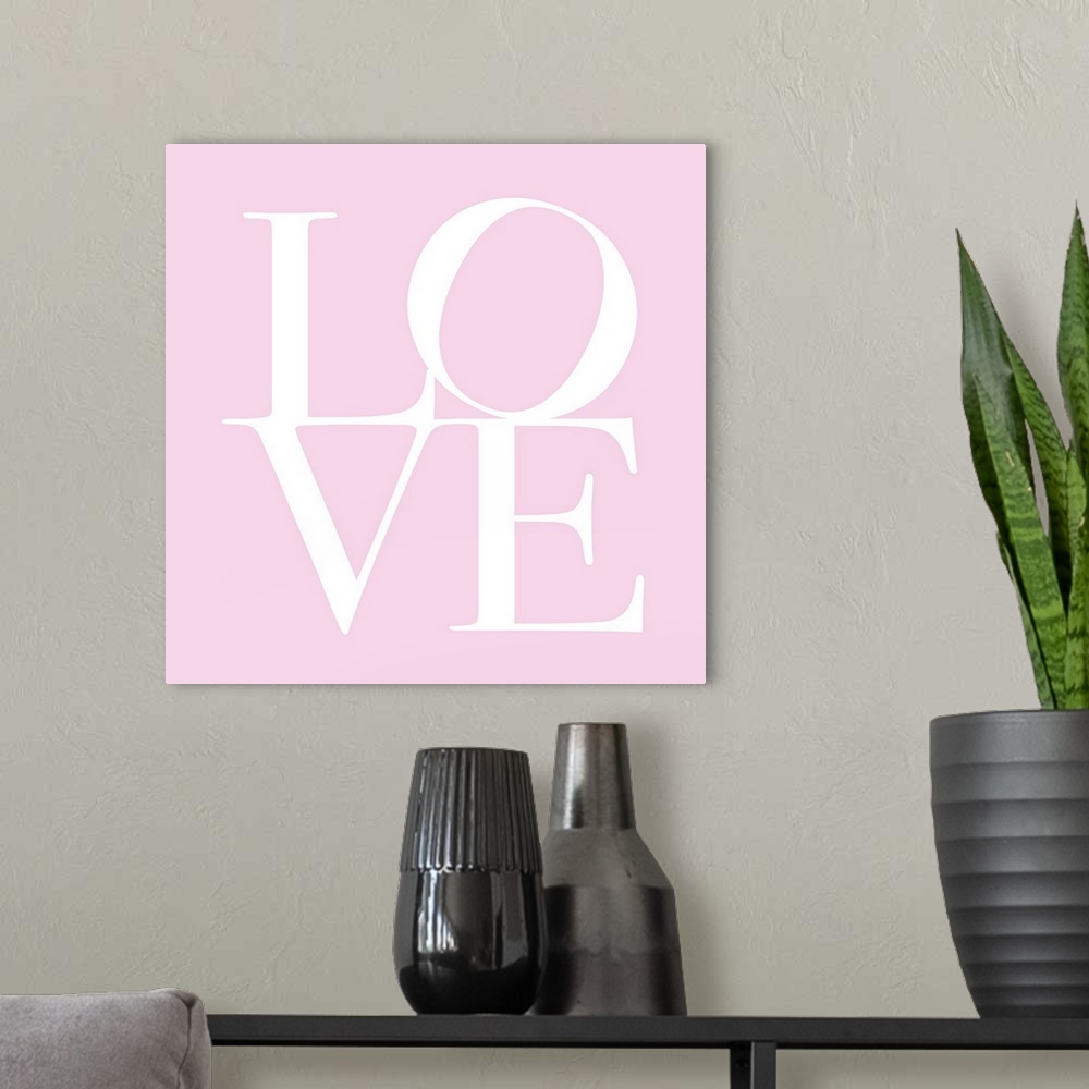 A modern room featuring Oversized, square, contemporary art  of the word "LOVE" written against a pink background. The wo...