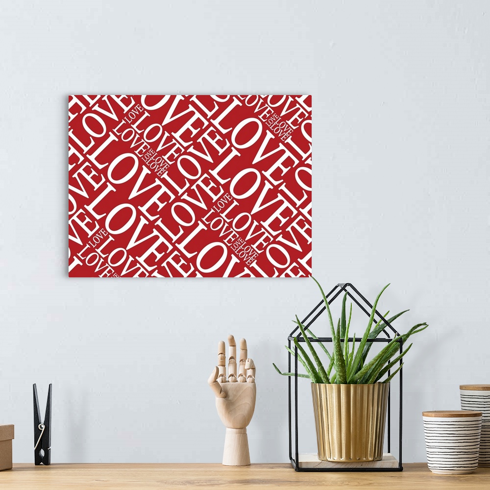 A bohemian room featuring Love in Red, typography text art print and canvas print, with the words LOVE written against a re...
