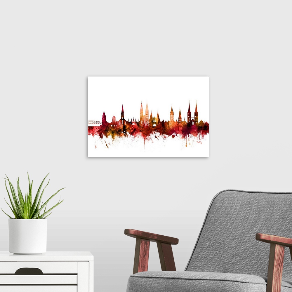 A modern room featuring Watercolor art print of the skyline of Lubeck, Germany.