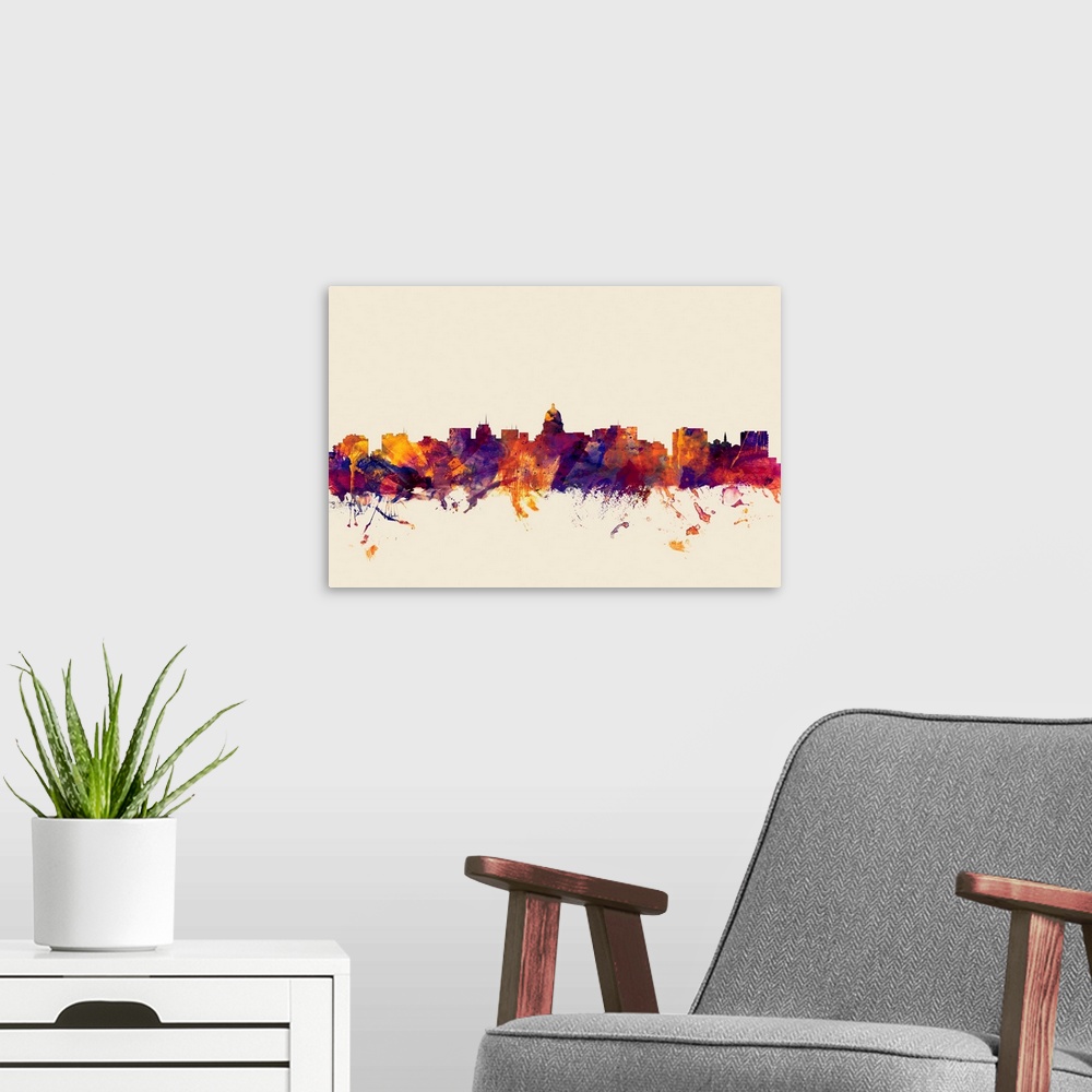 A modern room featuring Contemporary artwork of the Madison city skyline in watercolor paint splashes.
