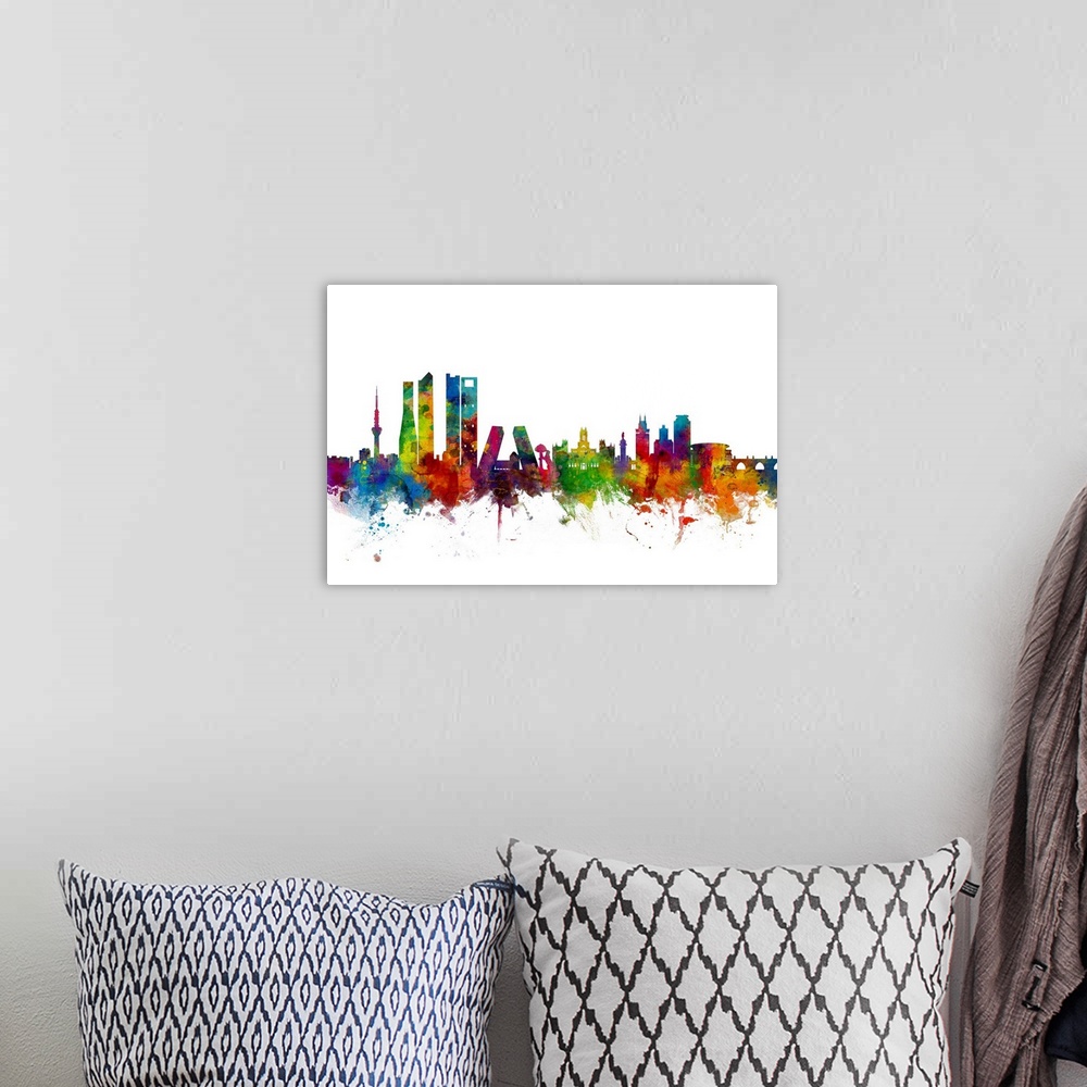 A bohemian room featuring Watercolor art print of the skyline of Madrid, Spain.