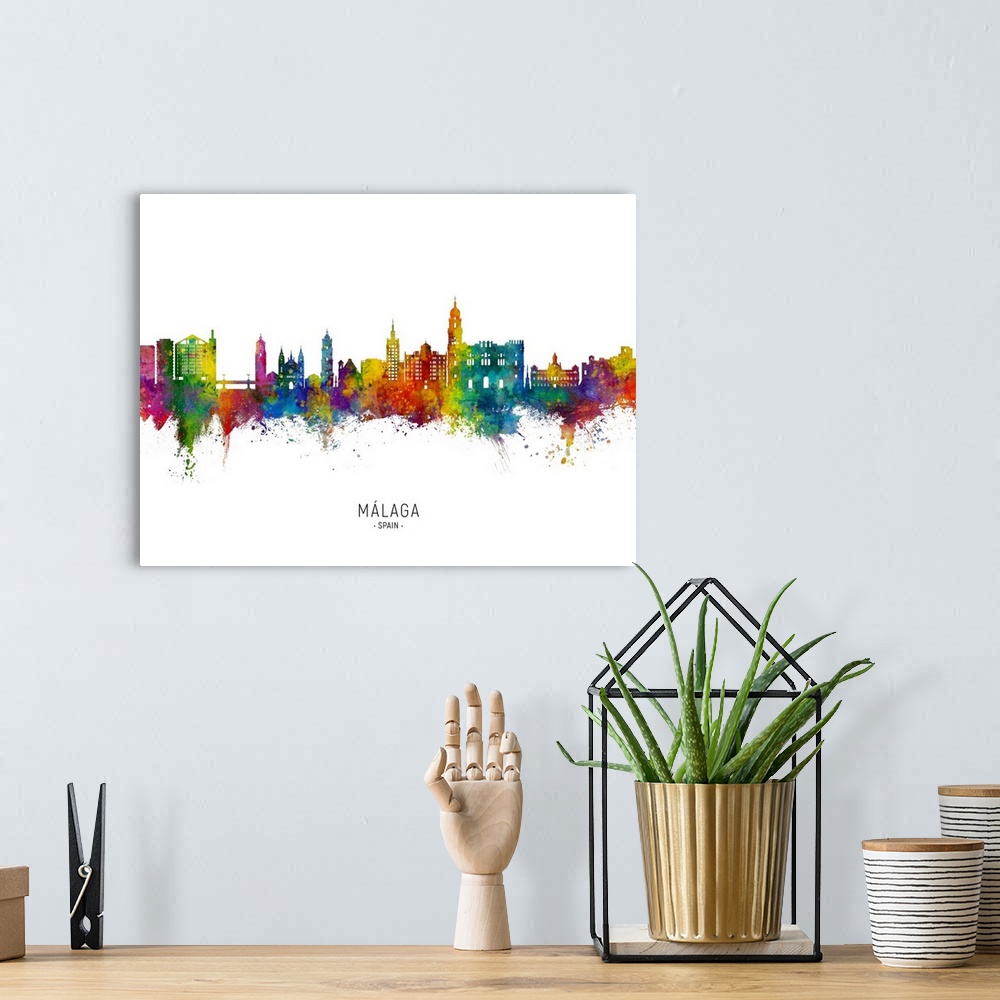 A bohemian room featuring Watercolor art print of the skyline of Malaga, Spain