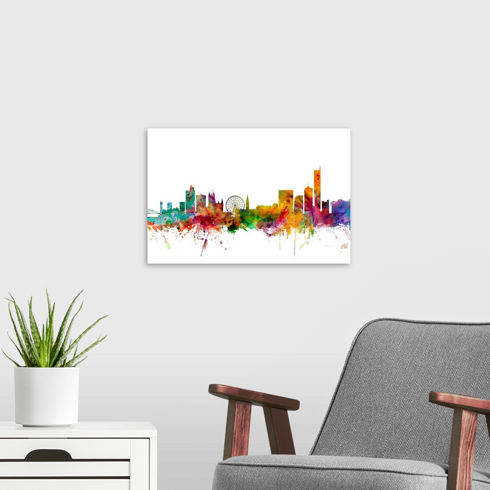 A modern room featuring Contemporary piece of artwork of the Manchester skyline made of colorful paint splashes.