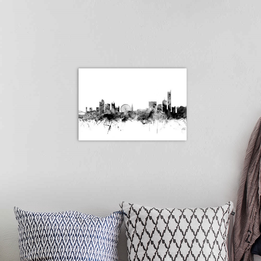 A bohemian room featuring Contemporary artwork of the Manchester city skyline in black watercolor paint splashes.