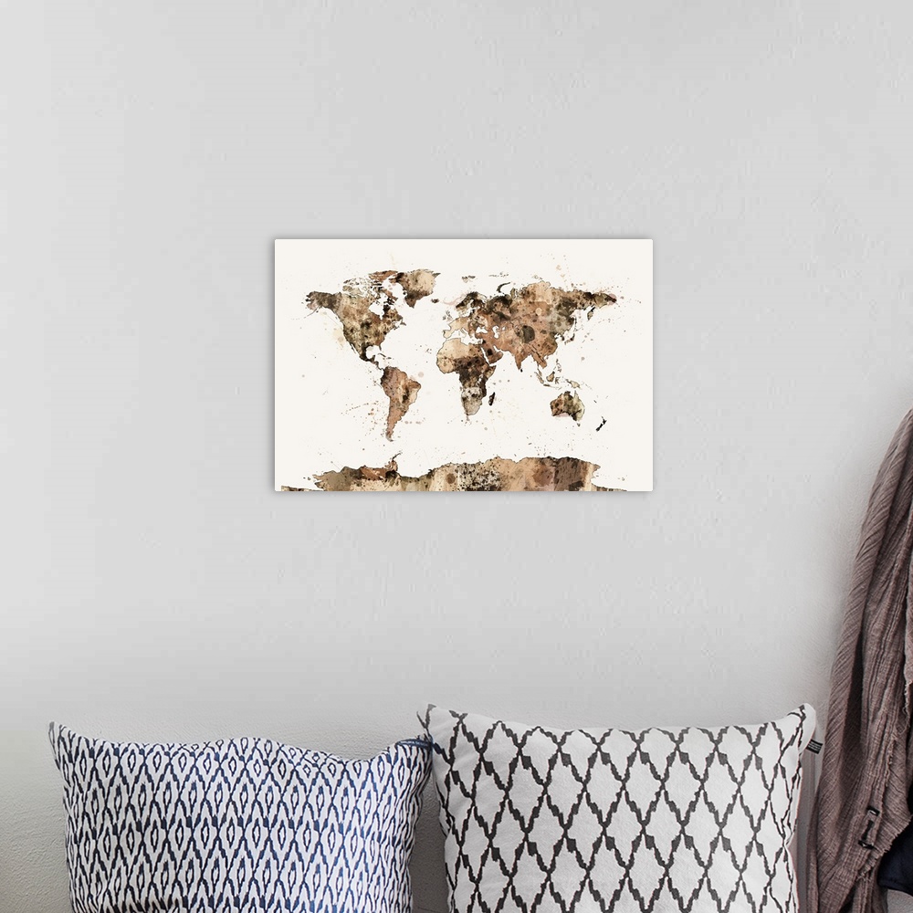 A bohemian room featuring Contemporary piece of artwork of a world map made of sepia paint splashes.