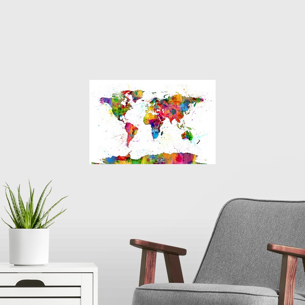 A modern room featuring Contemporary piece of artwork of a world map made of colorful paint splashes.
