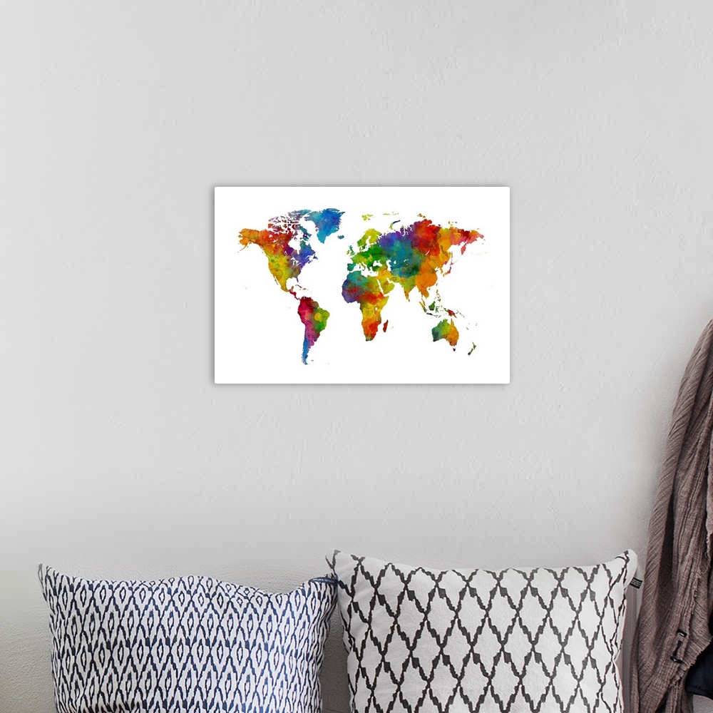A bohemian room featuring A bright and colorful world map.