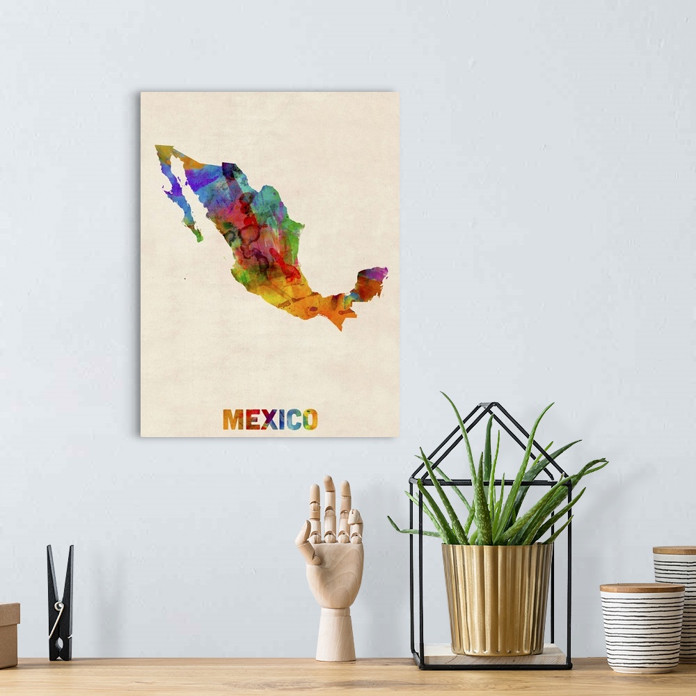A bohemian room featuring Contemporary piece of artwork of a map of Mexico made up of watercolor splashes.