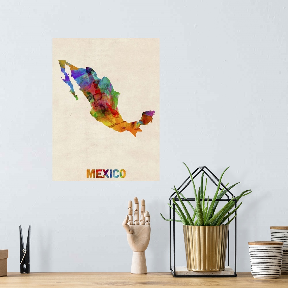 A bohemian room featuring Contemporary piece of artwork of a map of Mexico made up of watercolor splashes.
