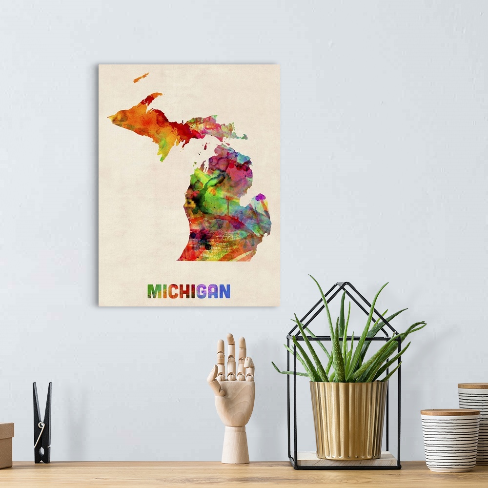 A bohemian room featuring Contemporary piece of artwork of a map of Michigan made up of watercolor splashes.