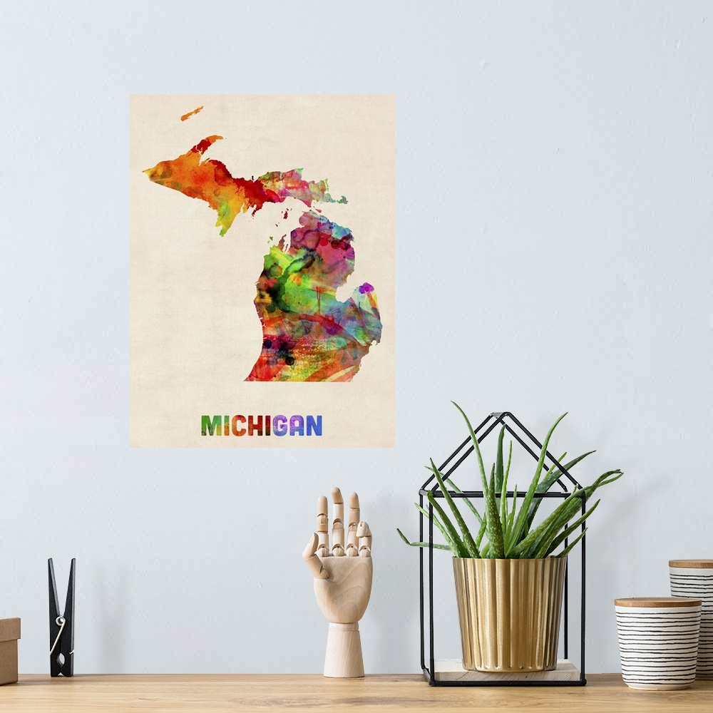 A bohemian room featuring Contemporary piece of artwork of a map of Michigan made up of watercolor splashes.