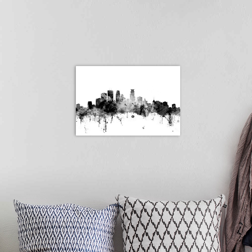 A bohemian room featuring Contemporary artwork of the Minneapolis city skyline in black watercolor paint splashes.