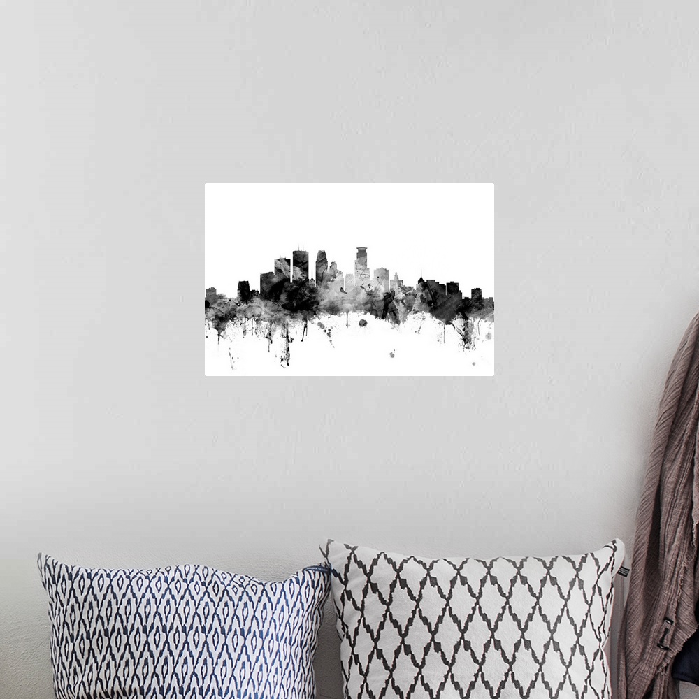A bohemian room featuring Contemporary artwork of the Minneapolis city skyline in black watercolor paint splashes.