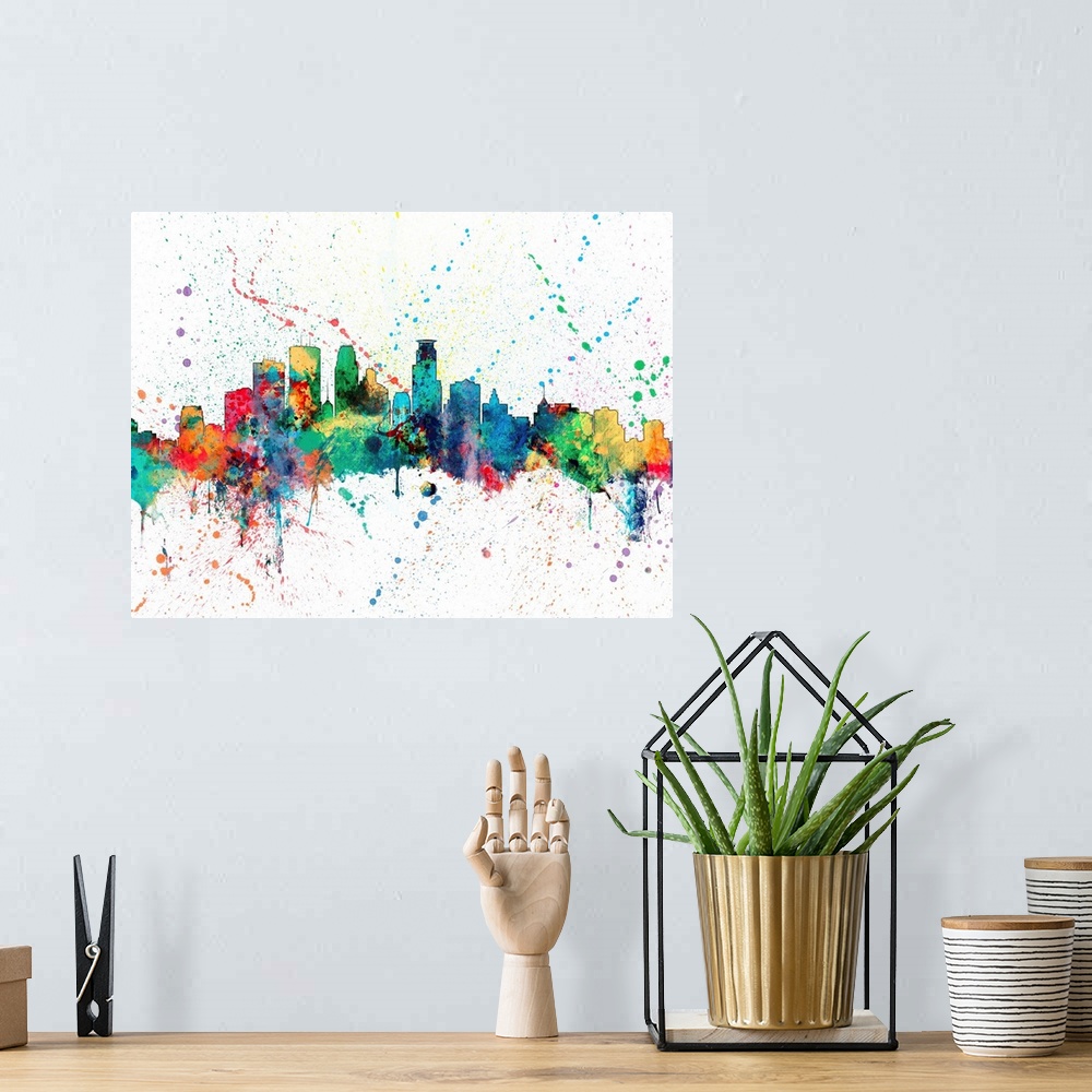 A bohemian room featuring Wild and vibrant paint splatter silhouette of the Minneapolis skyline.