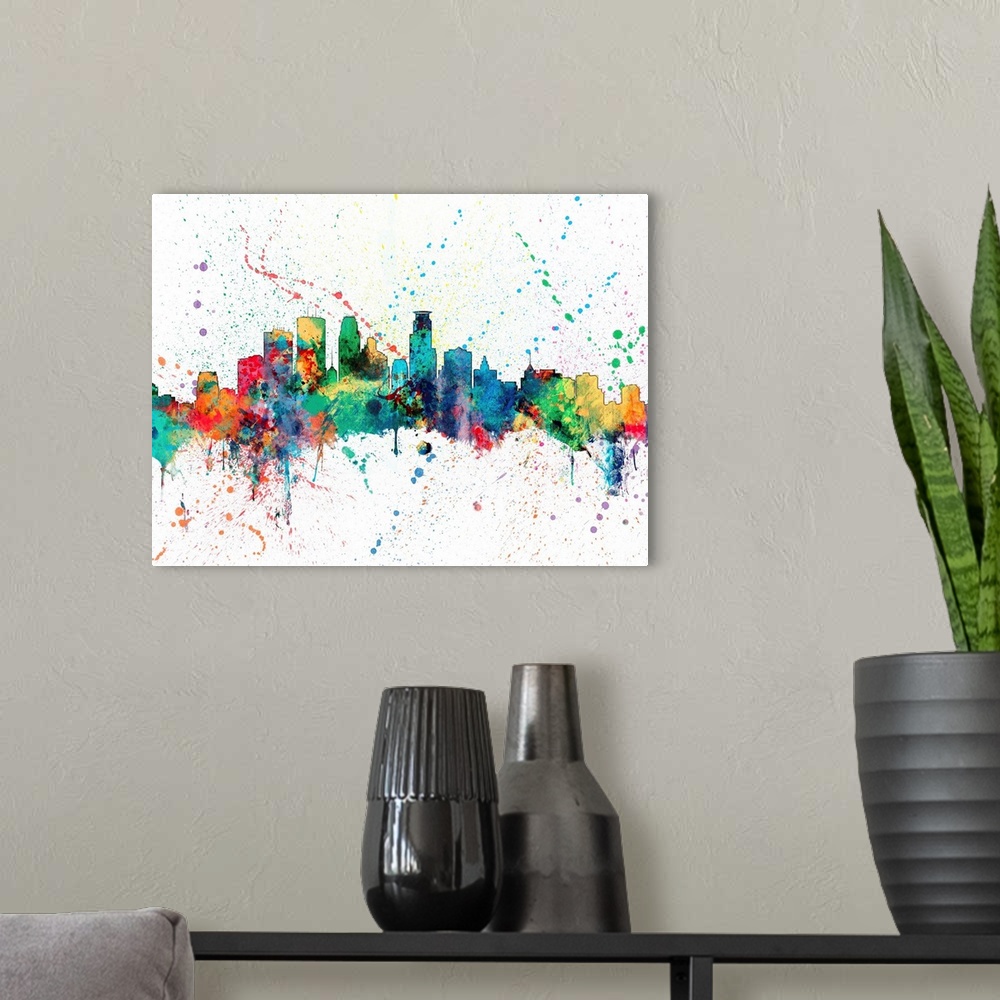 A modern room featuring Wild and vibrant paint splatter silhouette of the Minneapolis skyline.