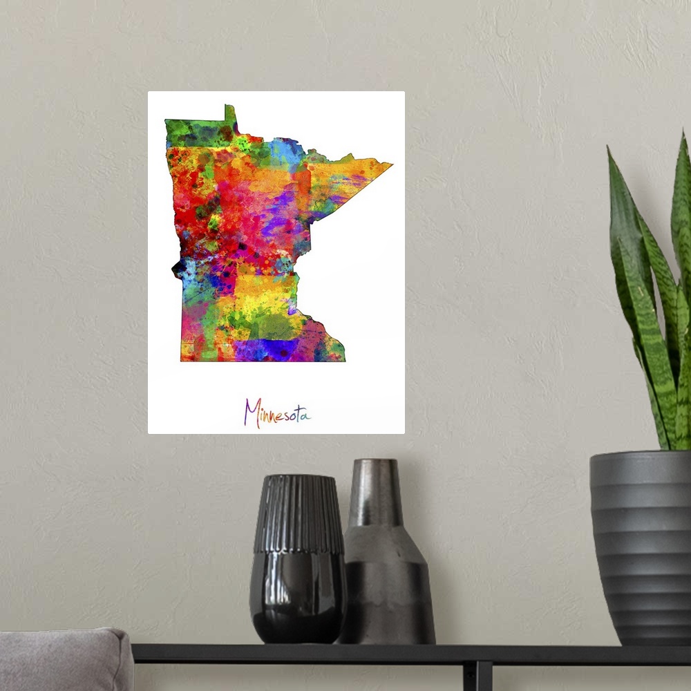 A modern room featuring Contemporary artwork of a map of Minnesota made of colorful paint splashes.