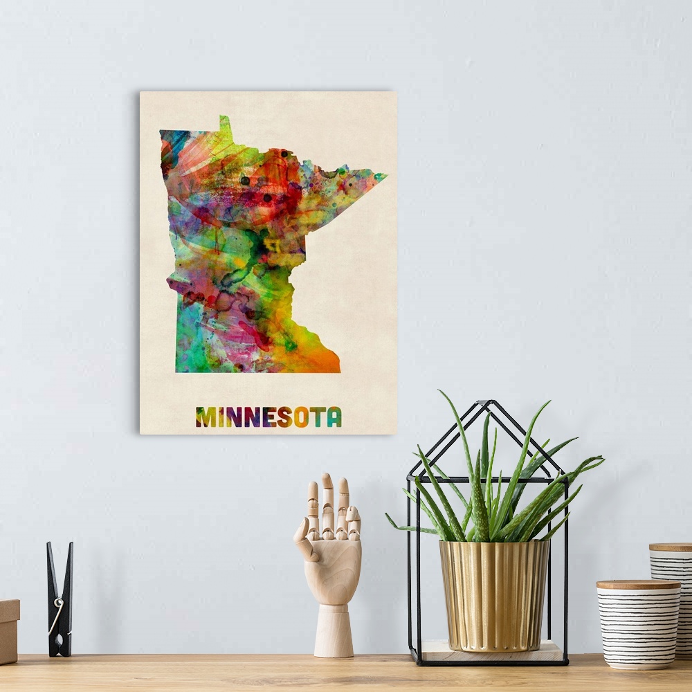 A bohemian room featuring Contemporary piece of artwork of a map of Minnesota made up of watercolor splashes.