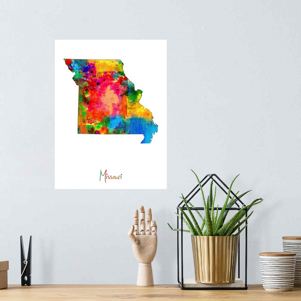 A bohemian room featuring Contemporary artwork of a map of Missouri made of colorful paint splashes.