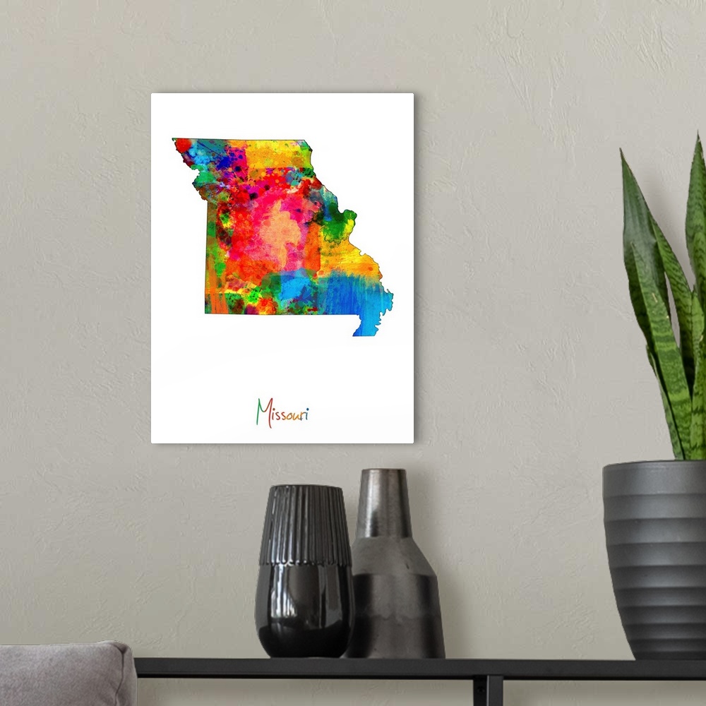 A modern room featuring Contemporary artwork of a map of Missouri made of colorful paint splashes.
