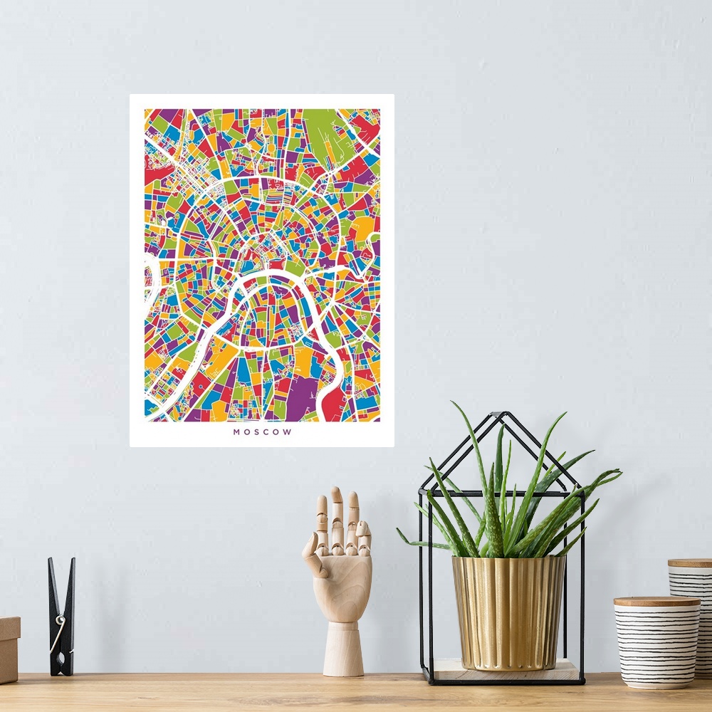 A bohemian room featuring Contemporary artwork of a map of the city streets of Moscow in different colors.