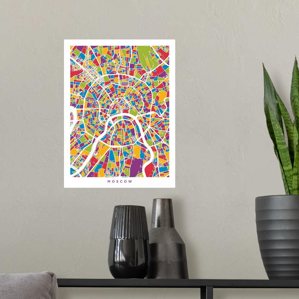 A modern room featuring Contemporary artwork of a map of the city streets of Moscow in different colors.