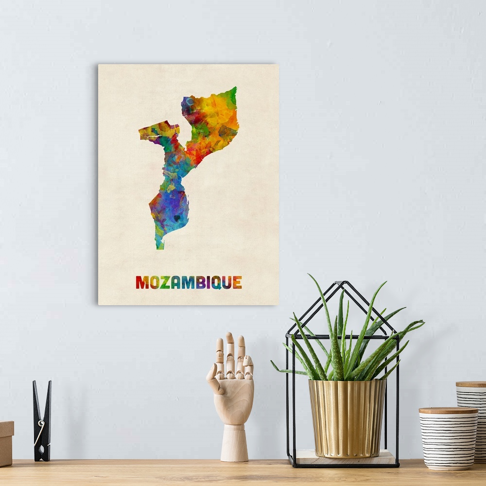 A bohemian room featuring A watercolor map of Mozambique.