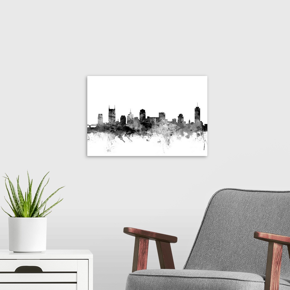 A modern room featuring Contemporary artwork of the Nashville city skyline in black watercolor paint splashes.