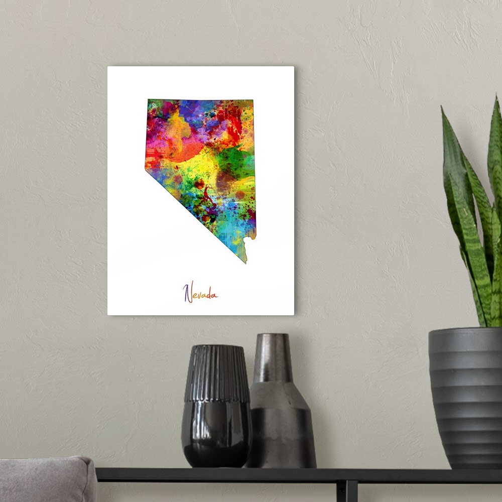 A modern room featuring Contemporary artwork of a map of Nevada made of colorful paint splashes.