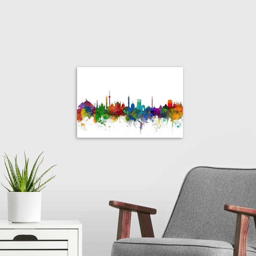 A modern room featuring Colorful watercolor splattered silhouetted of the New Delhi city skyline.