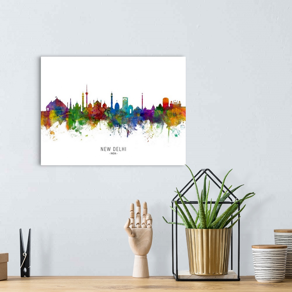 A bohemian room featuring Watercolor art print of the skyline of New Delhi, India.