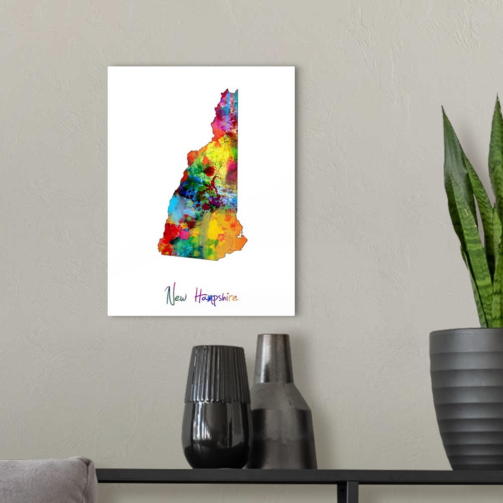 A modern room featuring Contemporary artwork of a map of New Hampshire made of colorful paint splashes.