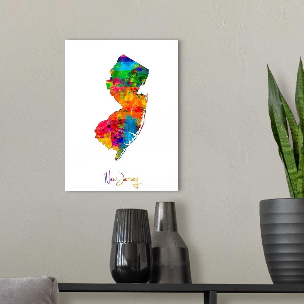 A modern room featuring Contemporary artwork of a map of New Jersey made of colorful paint splashes.