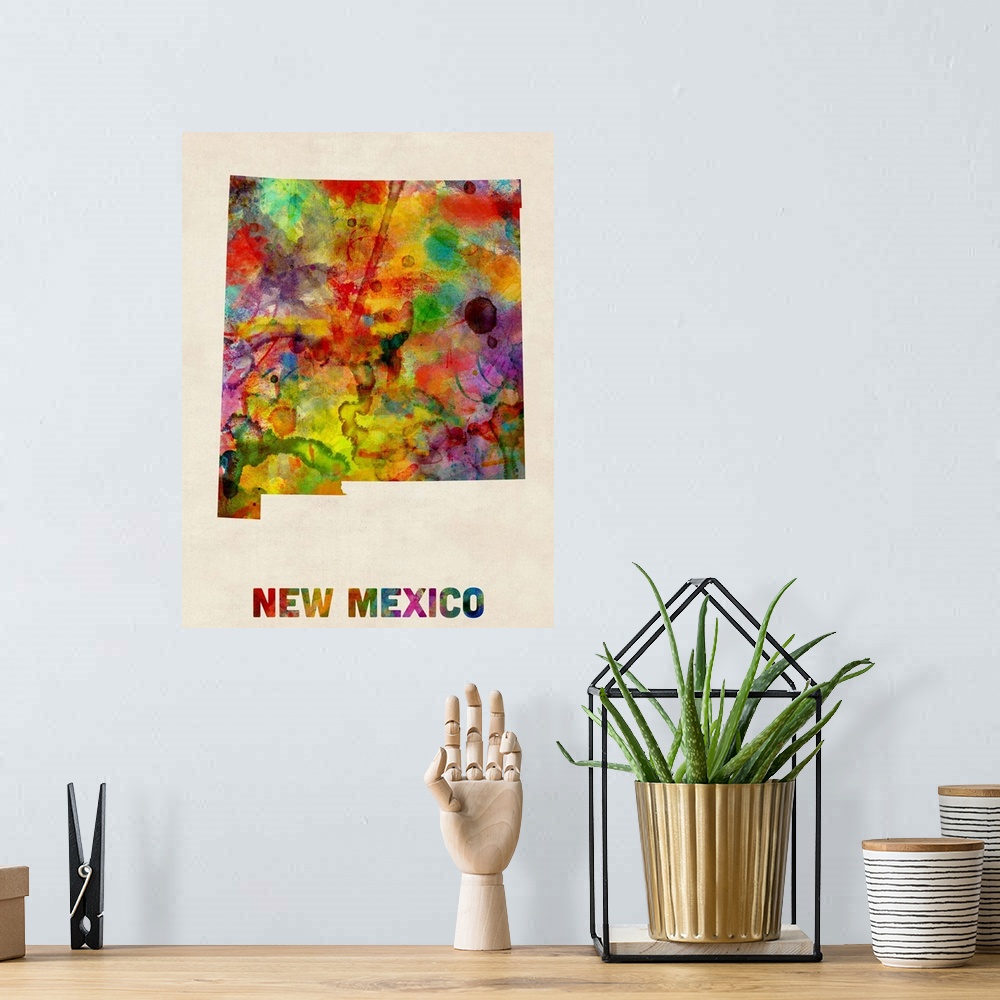 A bohemian room featuring Contemporary piece of artwork of a map of New Mexico made up of watercolor splashes.