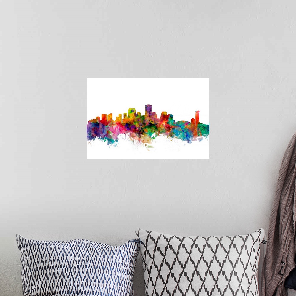 A bohemian room featuring Watercolor artwork of the New Orleans skyline against a white background.