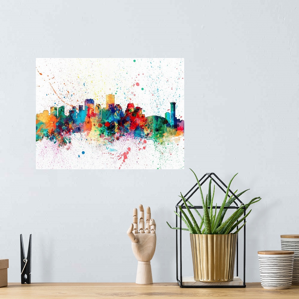 A bohemian room featuring Wild and vibrant paint splatter silhouette of the New Orleans skyline.