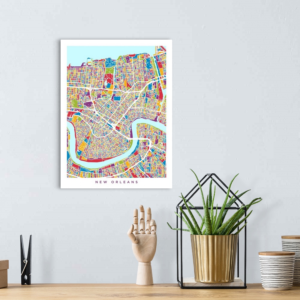 A bohemian room featuring Colorful city street map artwork of New Orleans.