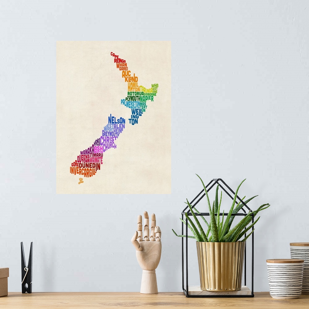 A bohemian room featuring Contemporary typography art map of New Zealand.