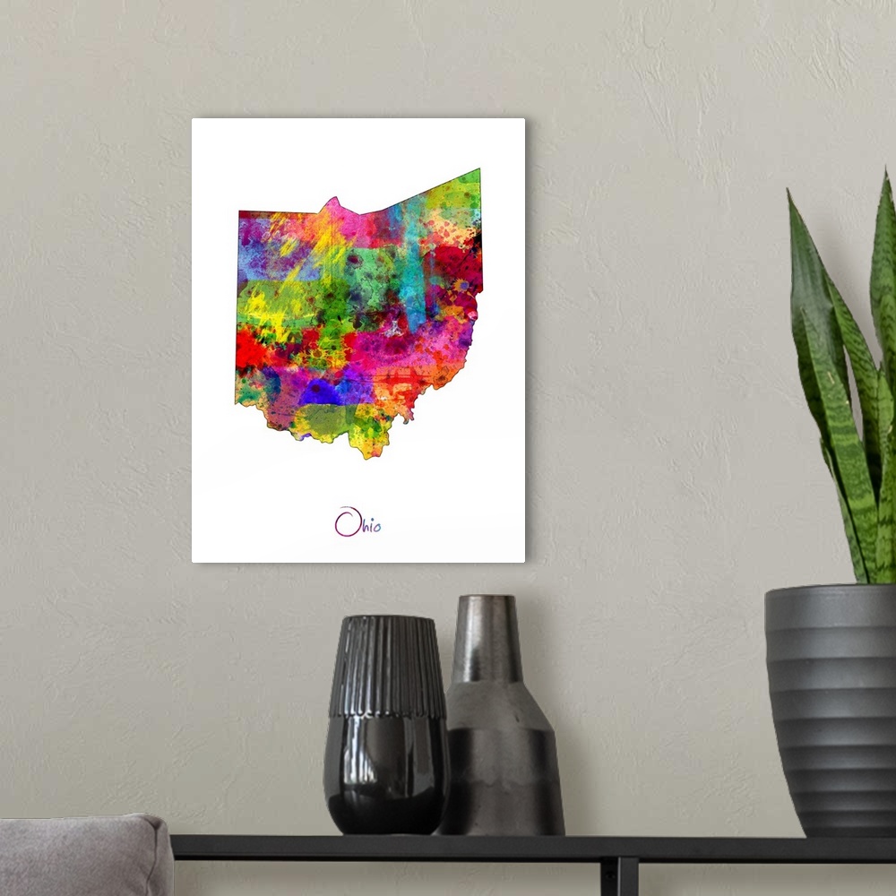 A modern room featuring Contemporary artwork of a map of Ohio made of colorful paint splashes.