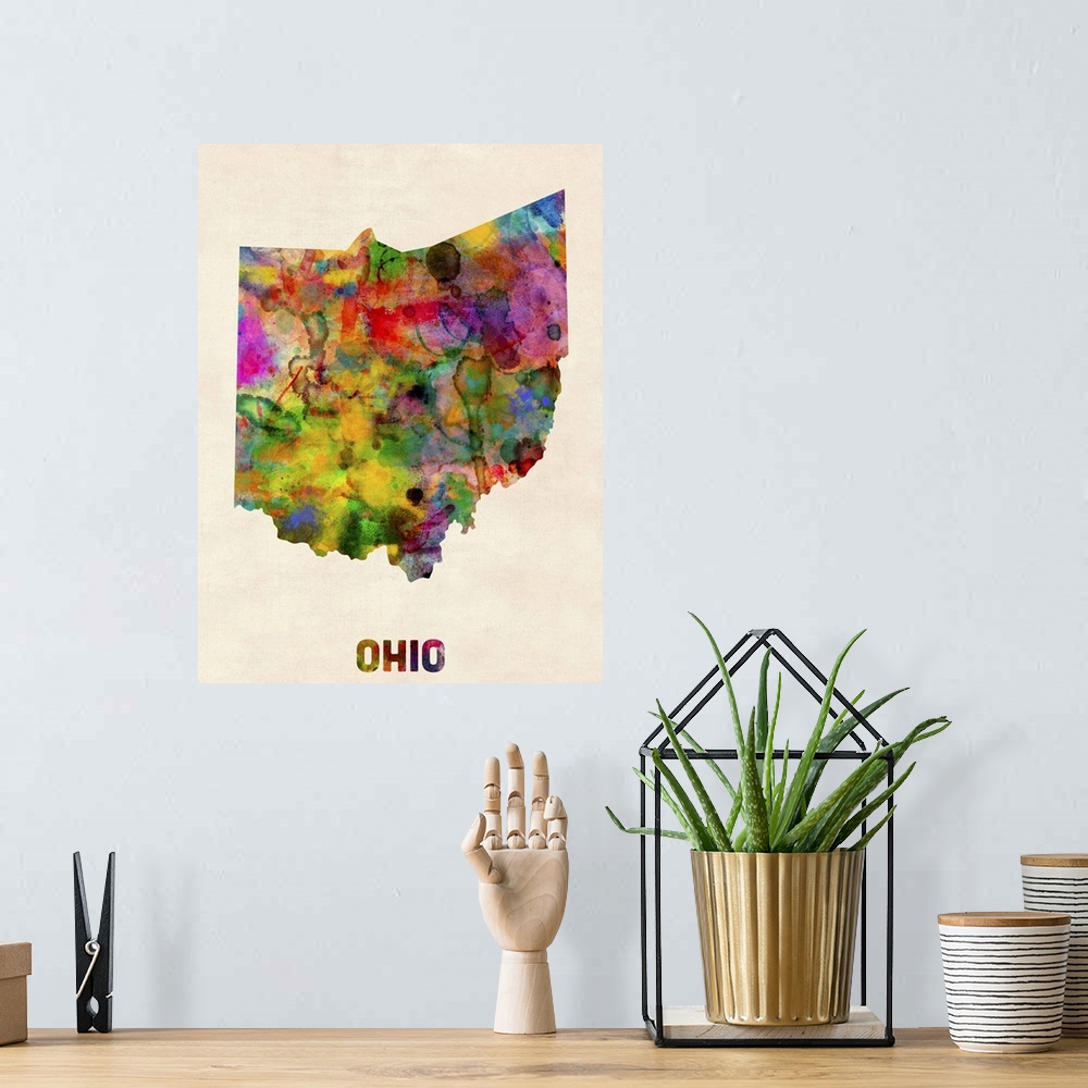 A bohemian room featuring Contemporary piece of artwork of a map of Ohio made up of watercolor splashes.