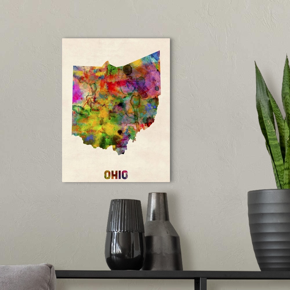 A modern room featuring Contemporary piece of artwork of a map of Ohio made up of watercolor splashes.