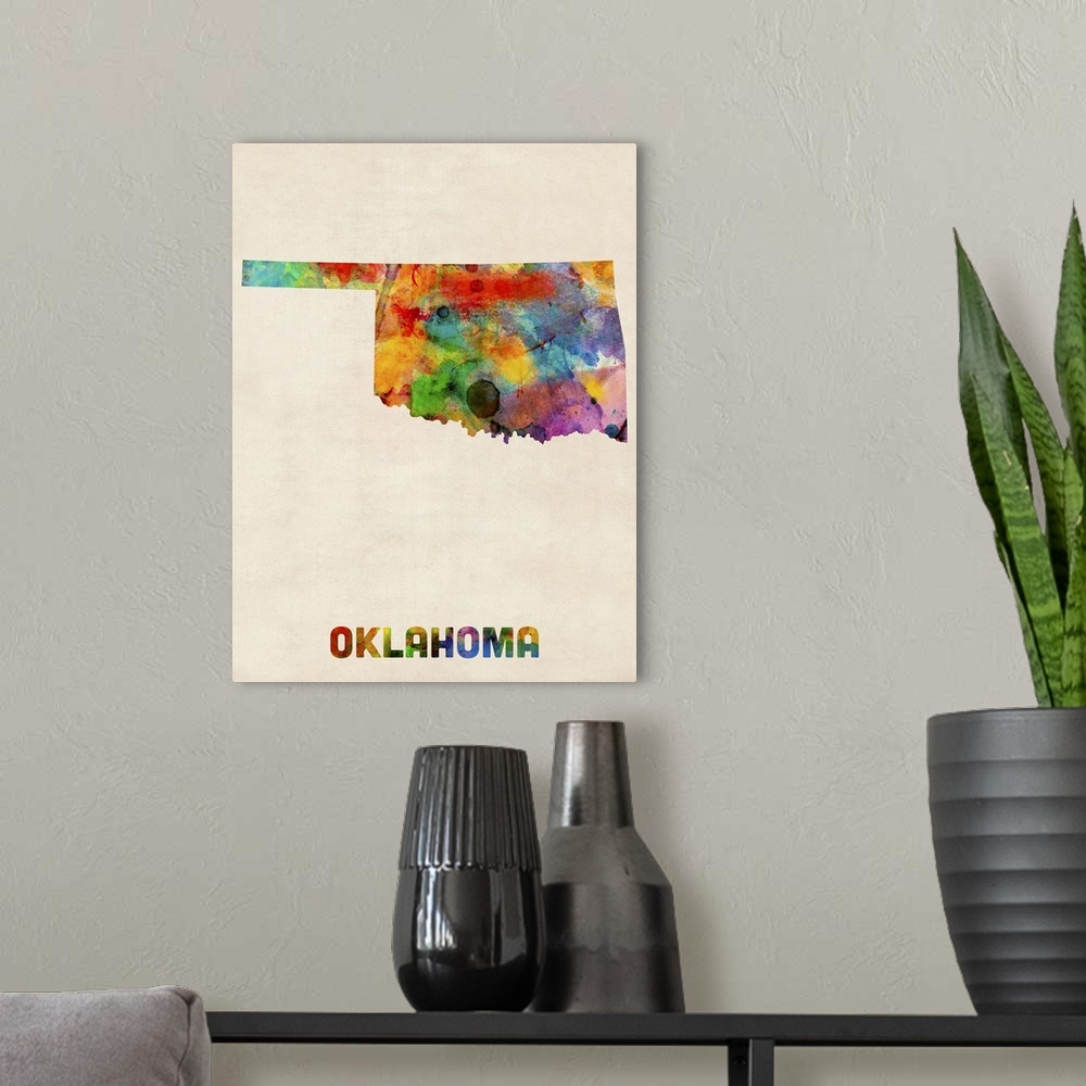 A modern room featuring Contemporary piece of artwork of a map of Oklahoma made up of watercolor splashes.