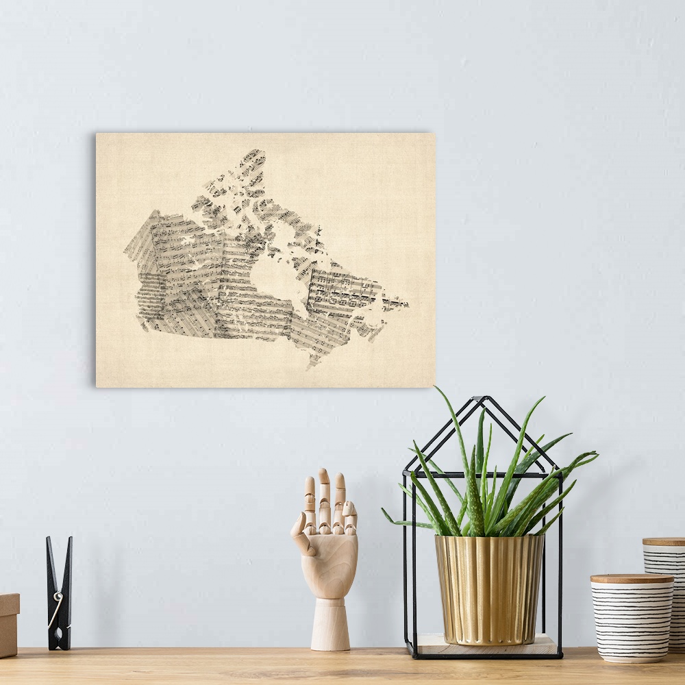 A bohemian room featuring Contemporary artwork of a country map made of old sheet music.
