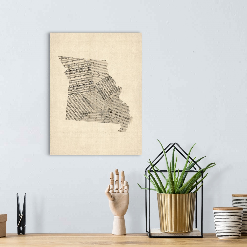 A bohemian room featuring A map of the Missouri, made from a collage of old and vintage sheet music on an antique style bac...