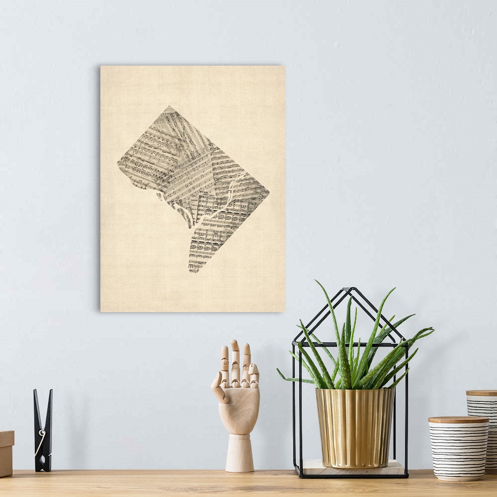 A bohemian room featuring A map of Washington DC made from a collage of old and vintage sheet music on an antique style bac...