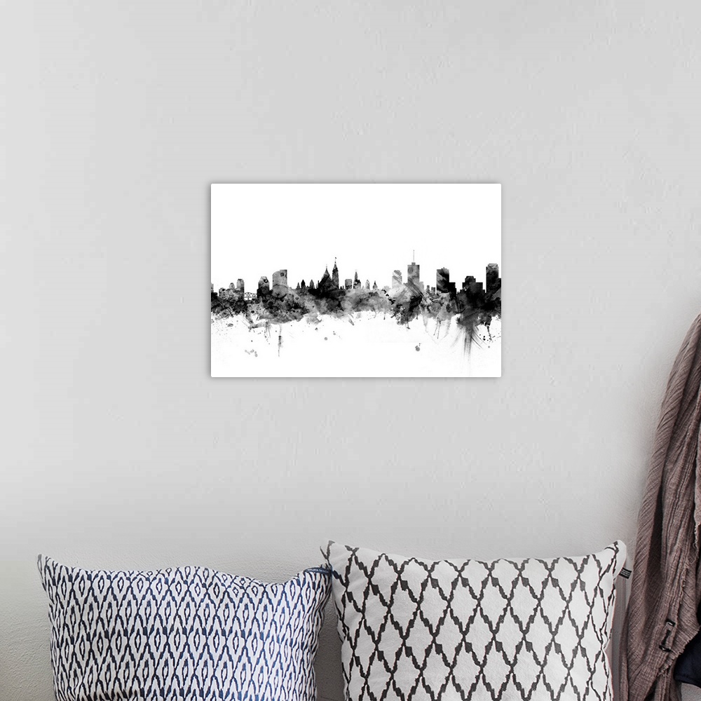 A bohemian room featuring Contemporary artwork of the Ottawa city skyline in black watercolor paint splashes.