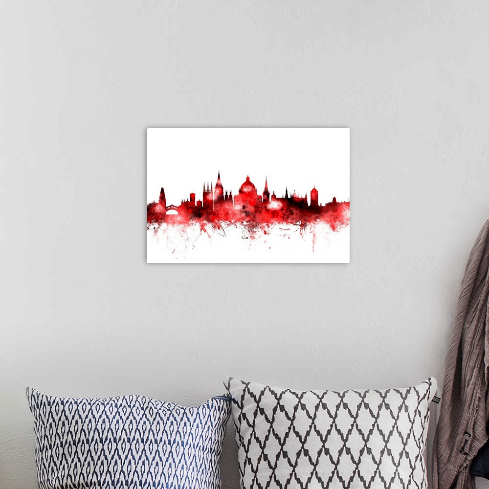 A bohemian room featuring Vibrant red watercolor silhouette of the Oxford city skyline.