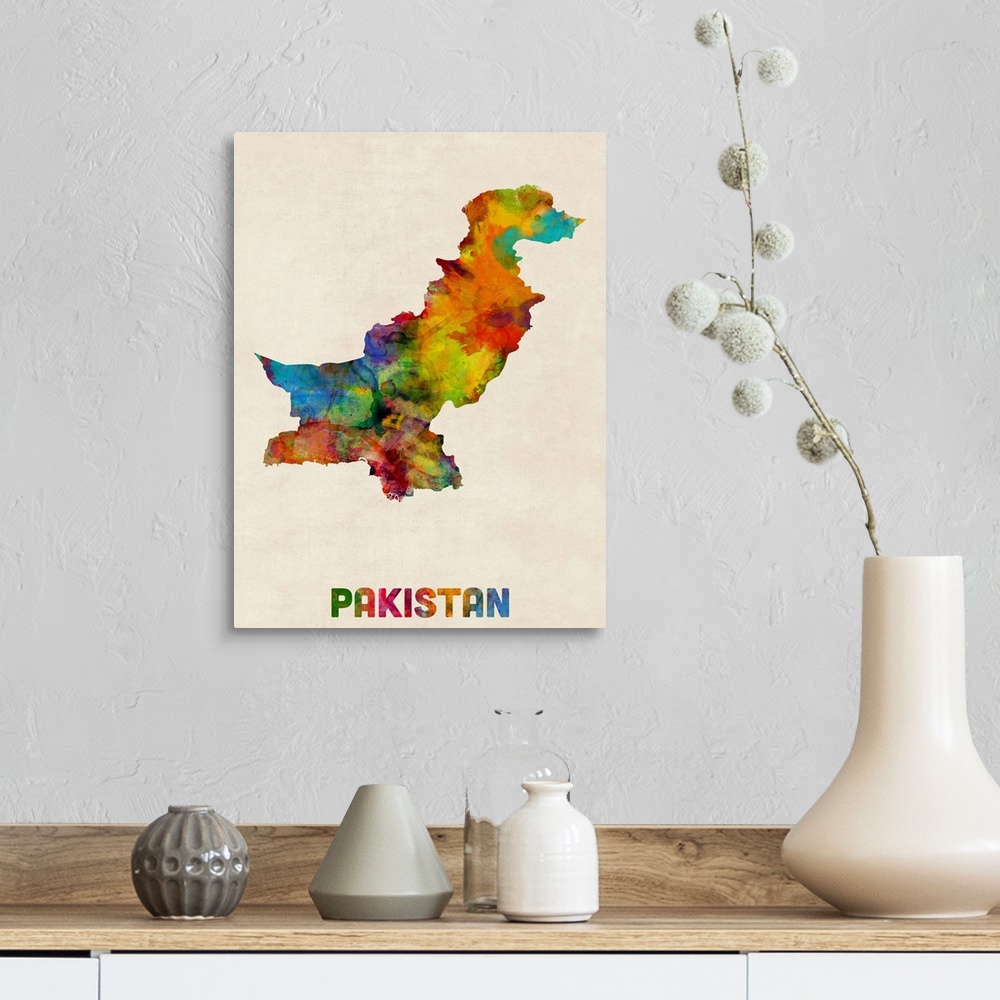 A farmhouse room featuring Contemporary piece of artwork of a map of Pakistan made up of watercolor splashes.