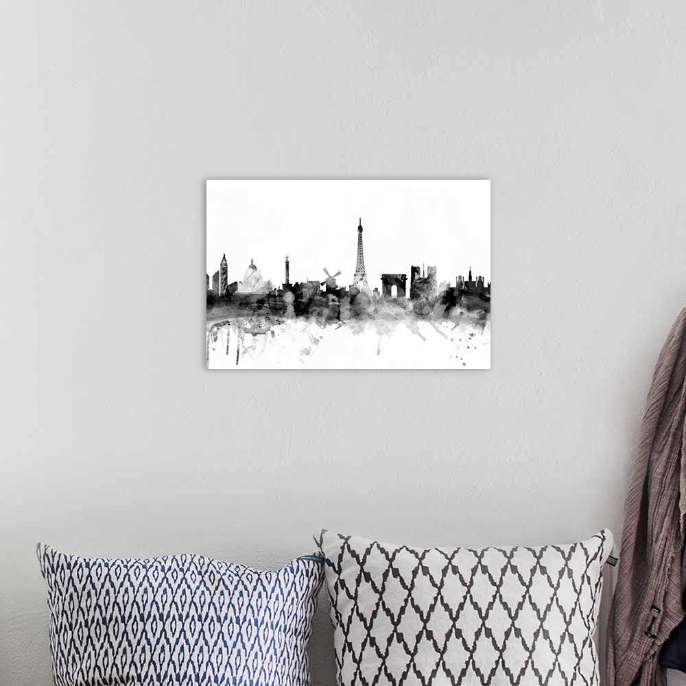 A bohemian room featuring Contemporary artwork of the Paris city skyline in black watercolor paint splashes.