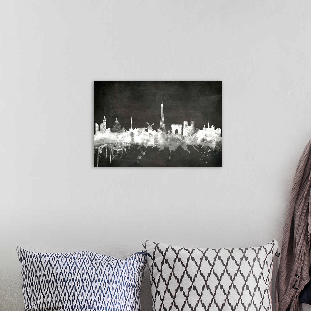 A bohemian room featuring Smokey dark watercolor silhouette of the Paris city skyline against chalkboard background.